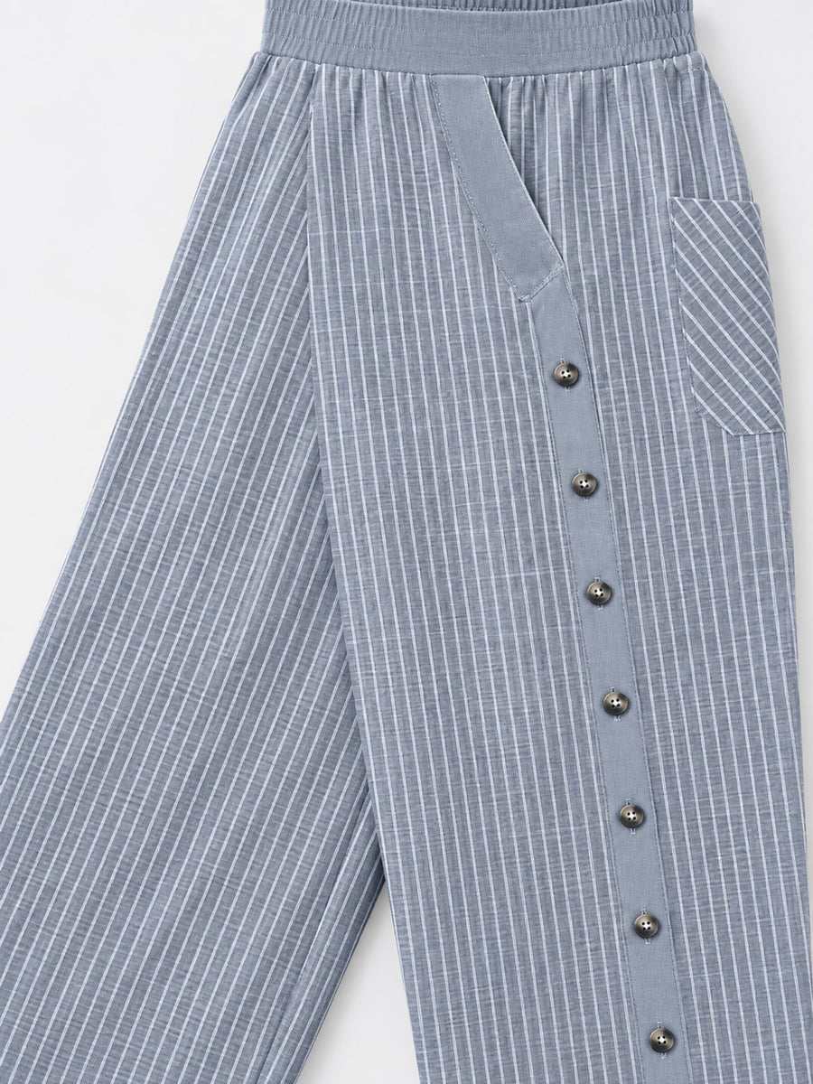 wide-leg pants in light blue with striped and decorative button