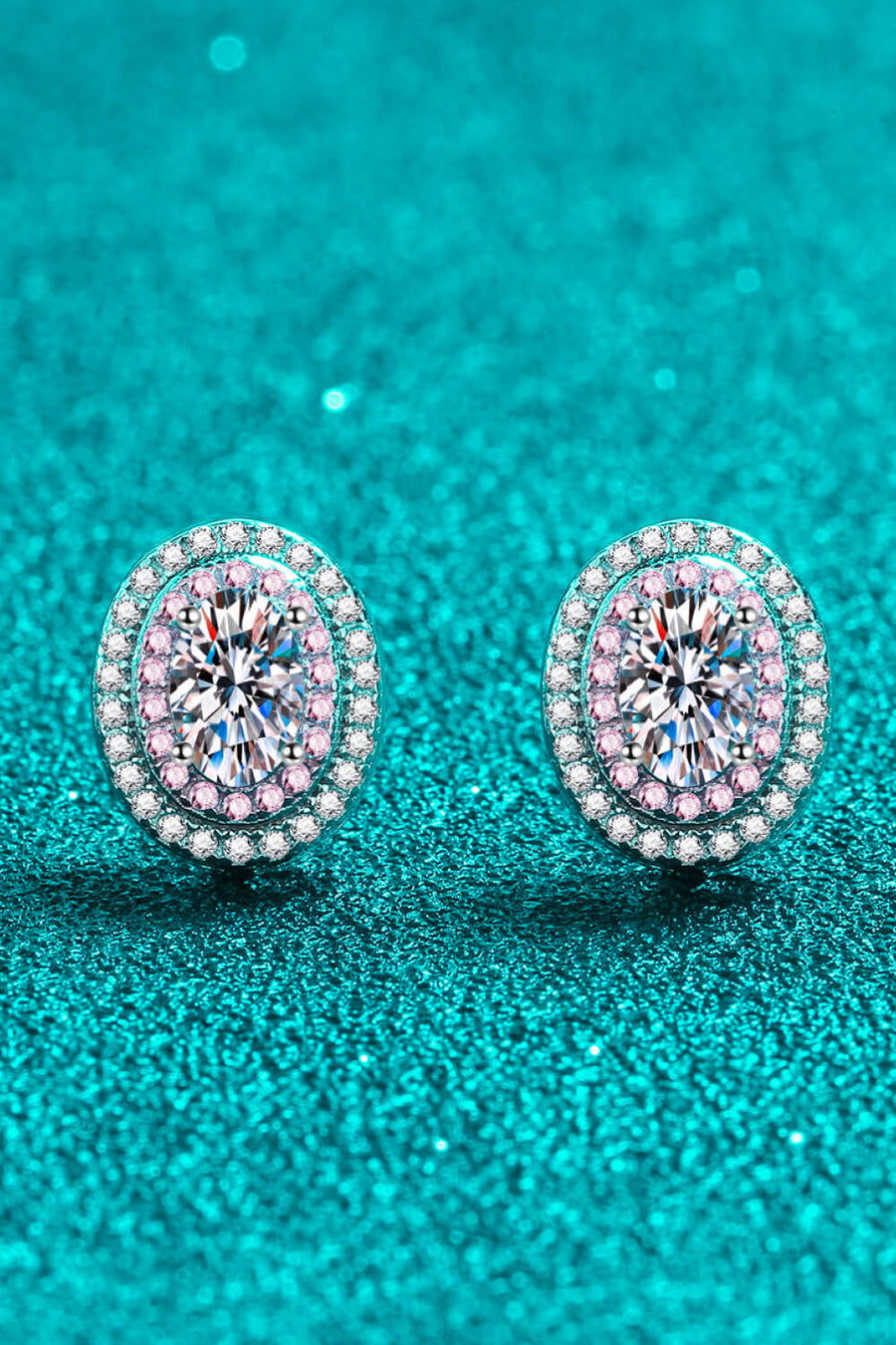 Halo moissanite stud earrings with pink accents and white diamond halo