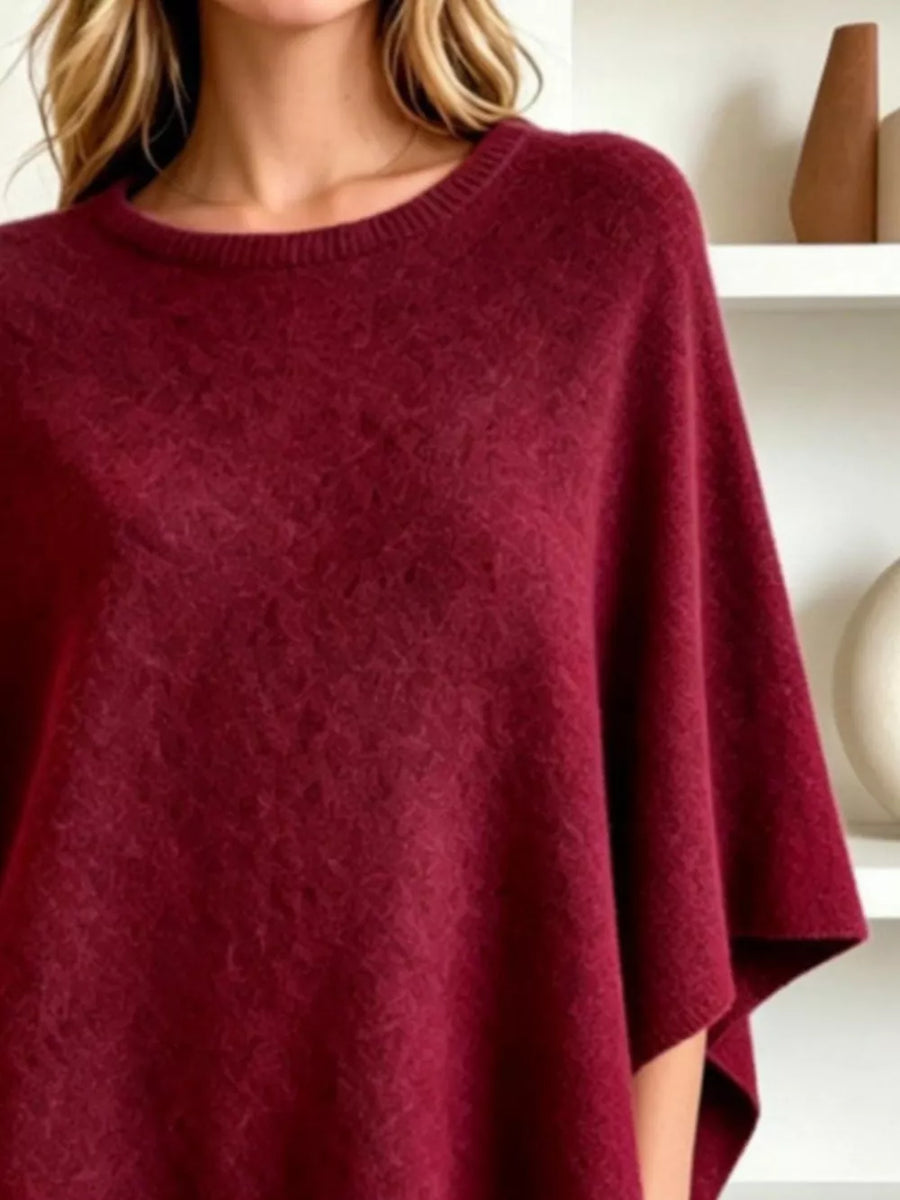 Black poncho with tunic-length and pullover
