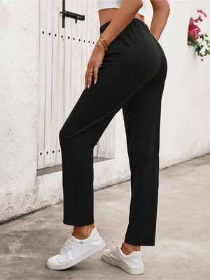 High-Waisted Slim Fit Pants in black with buttoned