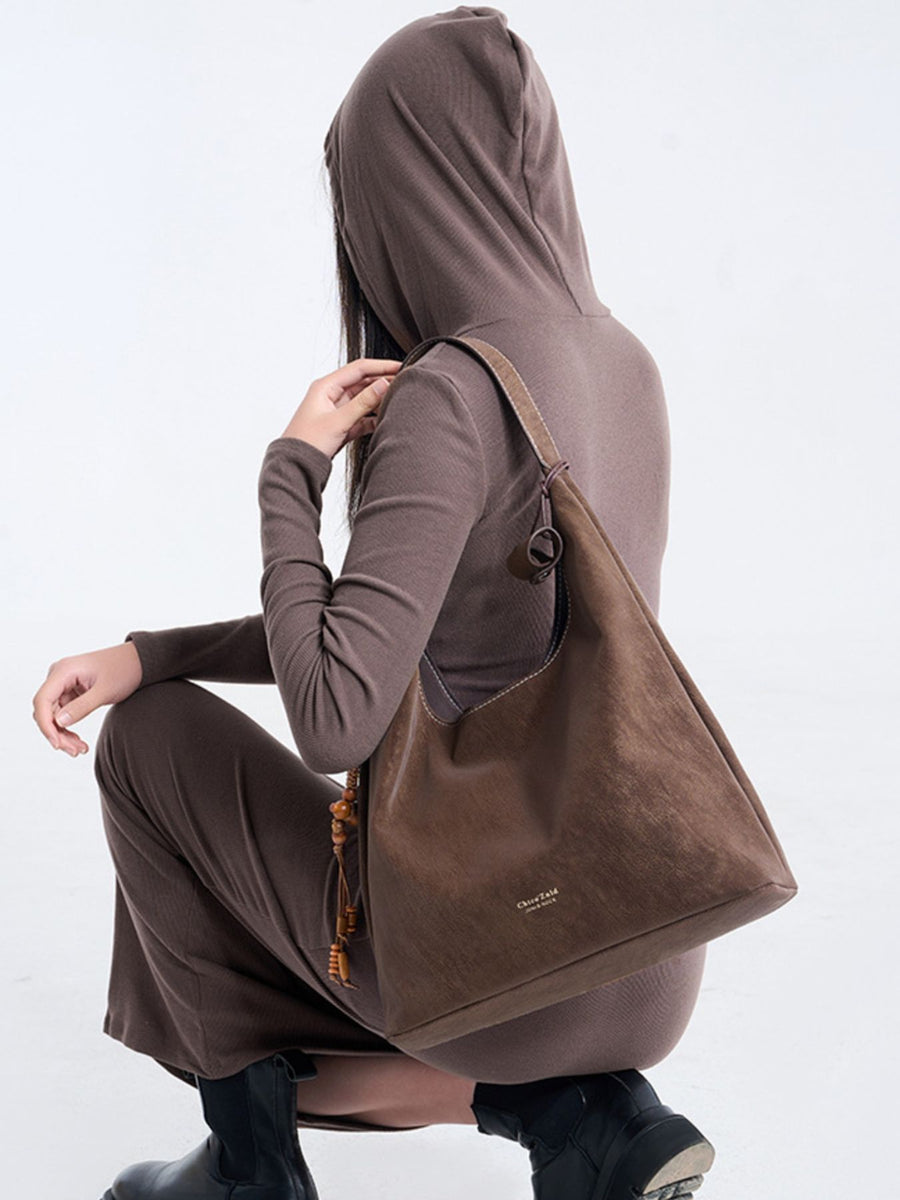 PU Leather Imported Size & handbag in dark brown with relaxed silhouette