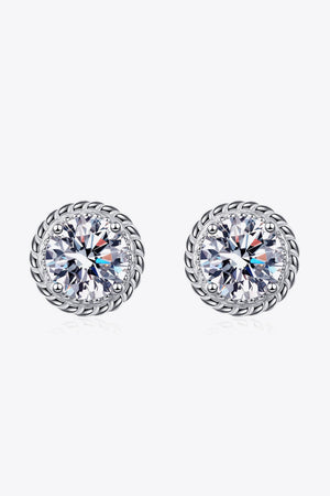 Silver rope-framed moissanite stud earrings with brilliant cut stones.