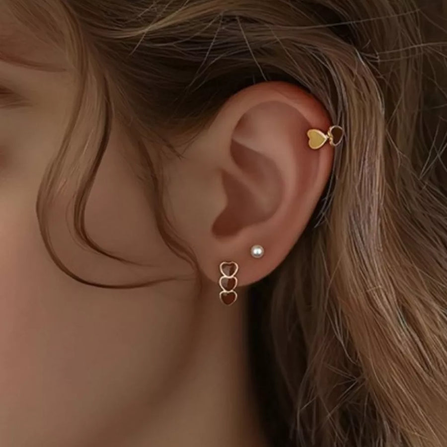 burgundy earrings featuring stud design and heart