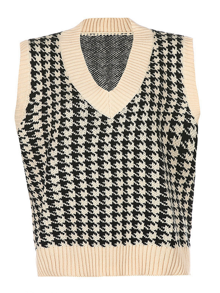 Houndstooth knit v-neck tank top in black and beige with ribbed trim.