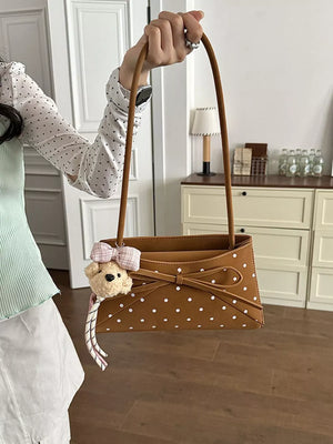 shoulder bag in Brown with polka dot and bowknot decor