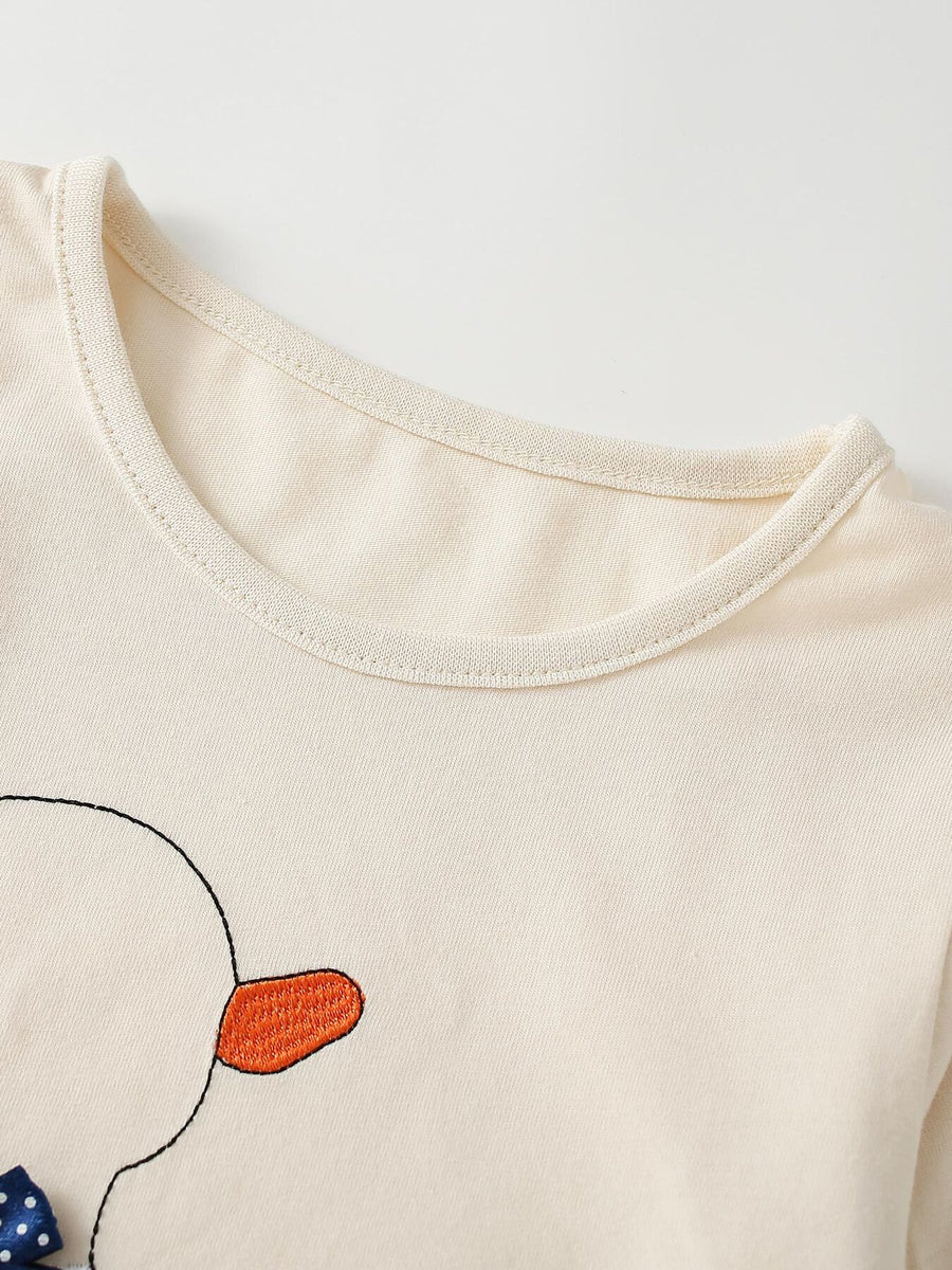 Cream sweatshirt featuring long sleeve and graphic-print