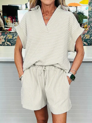 Chic beige striped cotton polo top and drawstring shorts set.