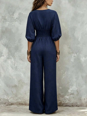 100% polyester Care instructions: Machine wash cold jumpsuit in Navy Blue with wide-leg silhouette