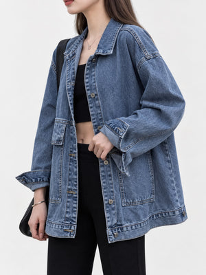 medium wash blue denim jacket with seam detail and long sleeve