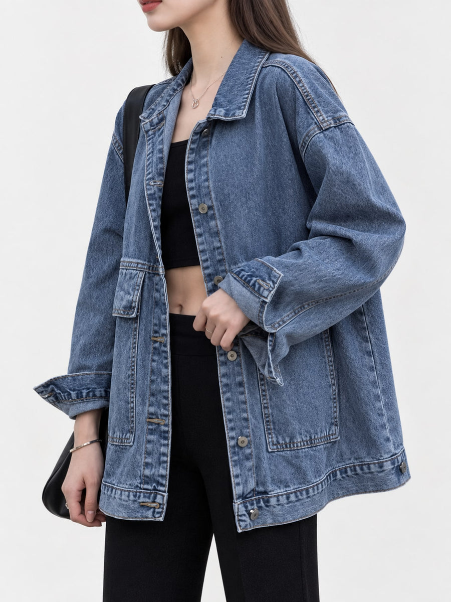 medium wash blue denim jacket with seam detail and long sleeve