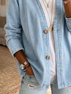 95% cotton,5% spandex Care instructions: Machine wash cold denim jacket in Light Blue with relaxed silhouette
