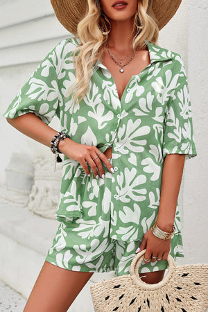 Light Green abstract print resort shirt with button-down front and short sleeves.