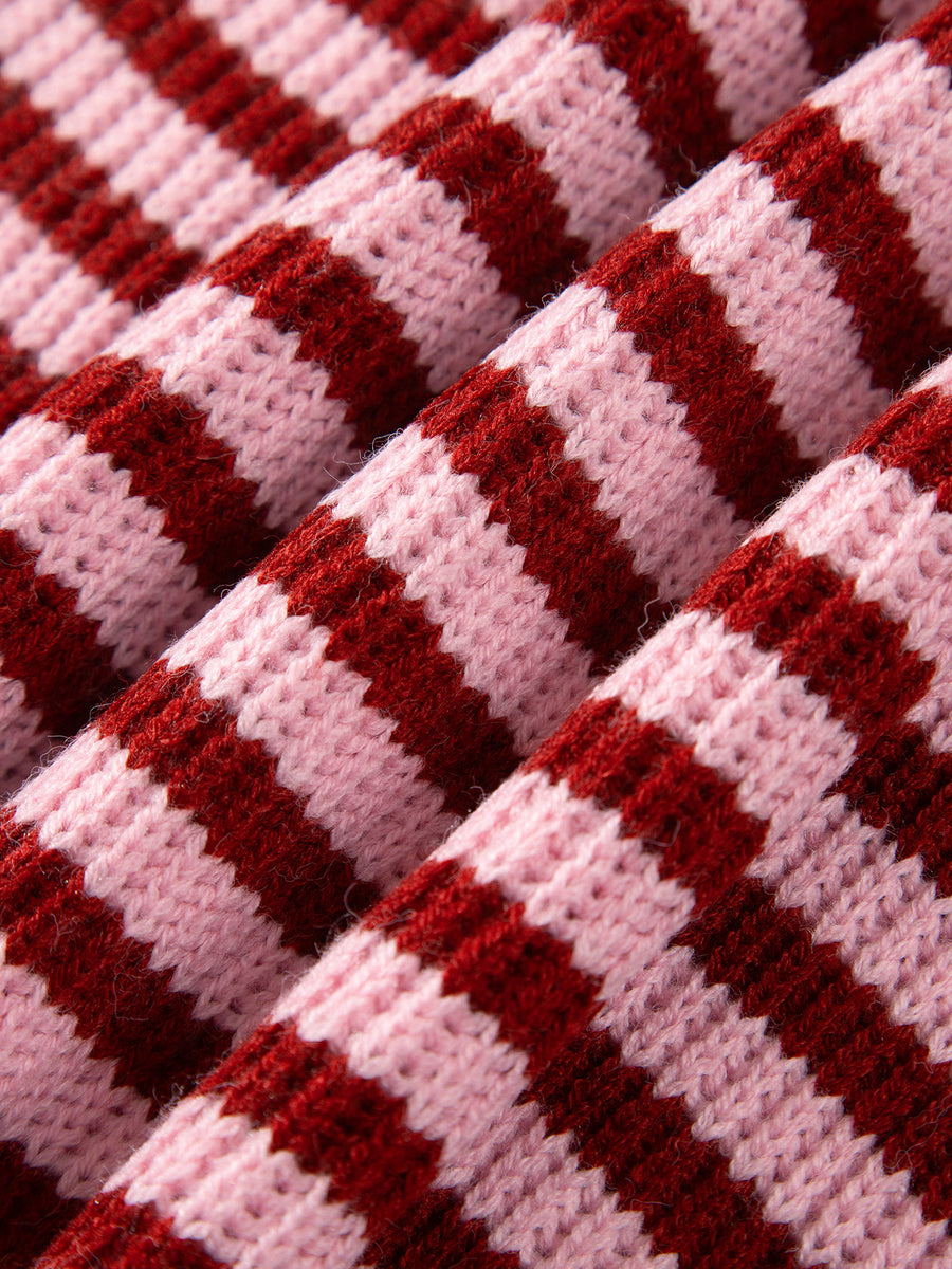 zip-up sweater in light pink with zipper and hip-length