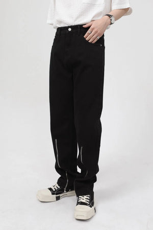 Black relaxed fit denim jeans with zip hem detail