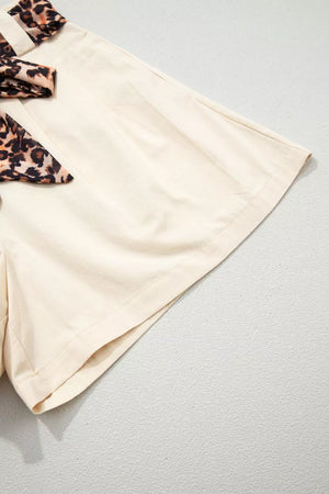 Cream shorts with leopard print bow detail
