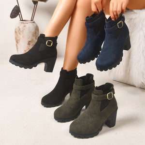 boots in black featuring block heel and structured fit
