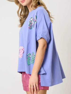 Blue polyester t-shirt with flip-flop print and rolled sleeves