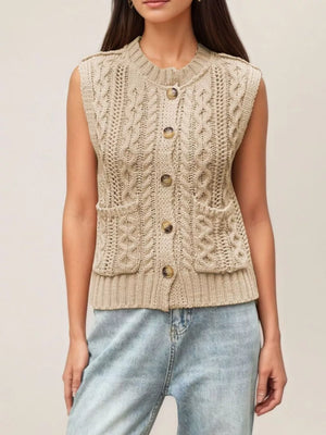 Brown sweater vest featuring cable-knit and cable knit