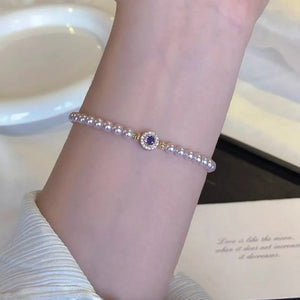 Synthetic Pearl,Alloy,Zircon Care instructions: Avoid wearing during exercise, a bracelet in gold with fitted silhouette