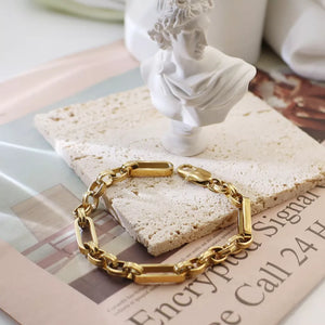 18K Gold-Plated,Titanium Steel Care instructions: Avoid wearing during exercise, bracelet in Gold with straight silhouette