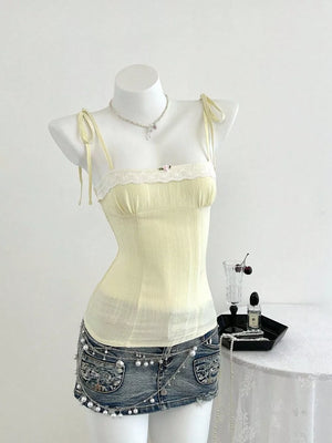 camisole in light yellow featuring smocked and fitted fit