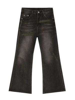 Dark wash flared jeans with distressed details and a button fly.