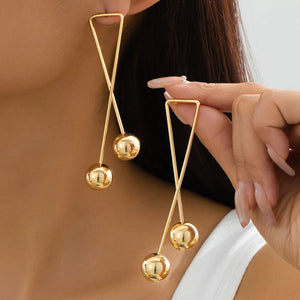 earrings in gold featuring drop design and straight fit