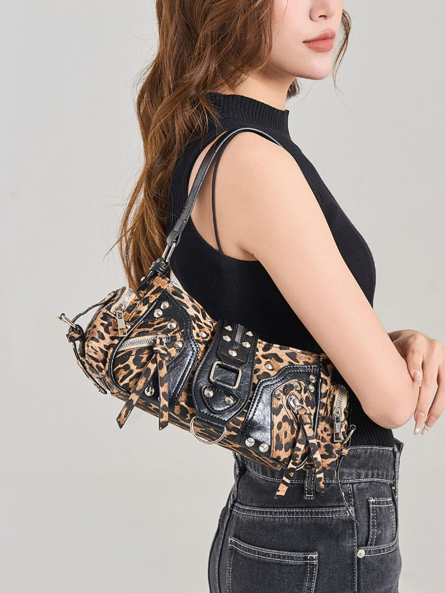 shoulder bag in Black with leopard-print and buckle