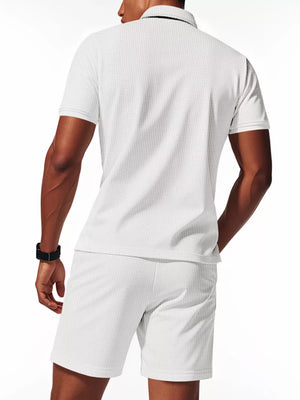 Men's white textured polo shirt and shorts ensemble, short sleeve, casual activewear set.