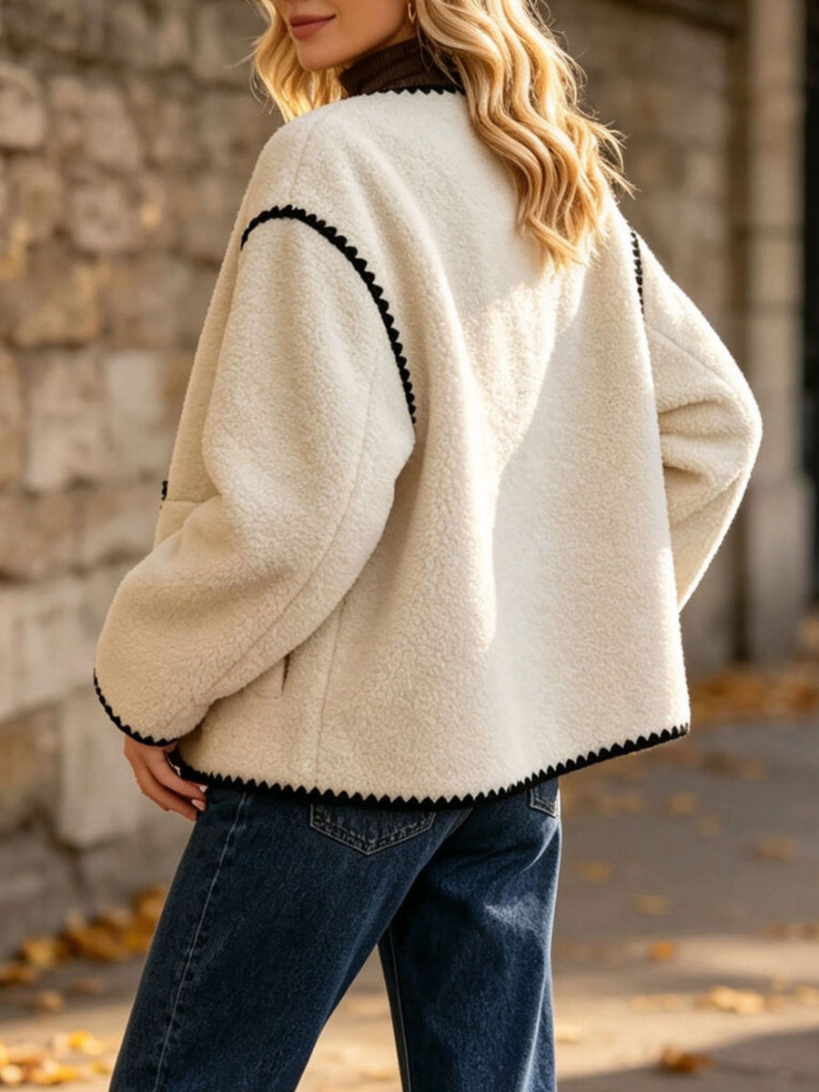 100% polyester Care instructions: Machine wash cold jacket in ivory with boxy silhouette