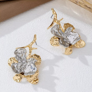silver earrings featuring statement and floral