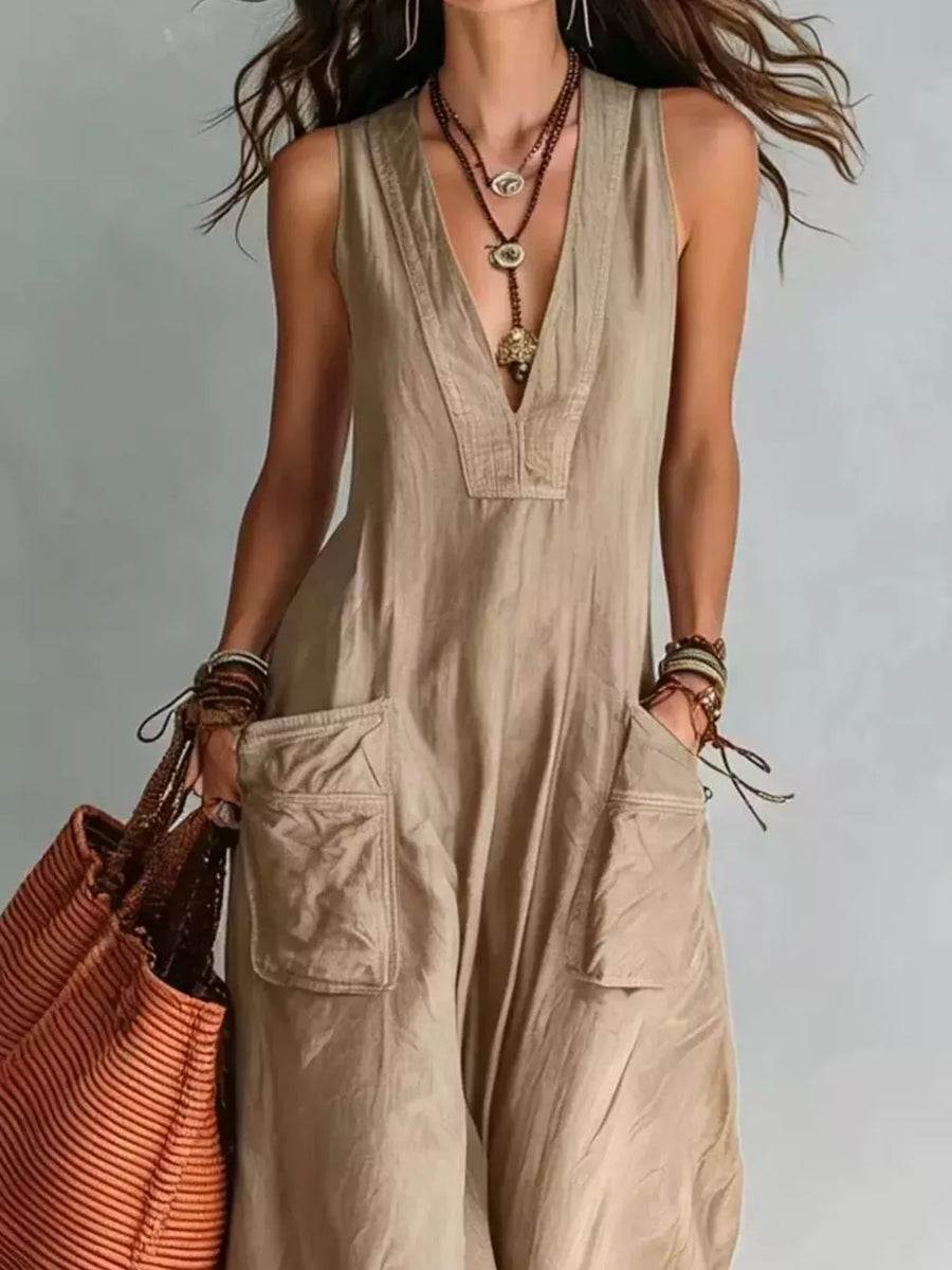 denim blue jumpsuit with v-neck and sleeveless