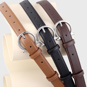 Sophisticated cowhide leather belts in black, brown, and coffee brown with Omega buckles.