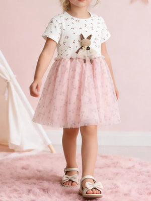 Blush pink tulle dress with floral print and bunny applique.