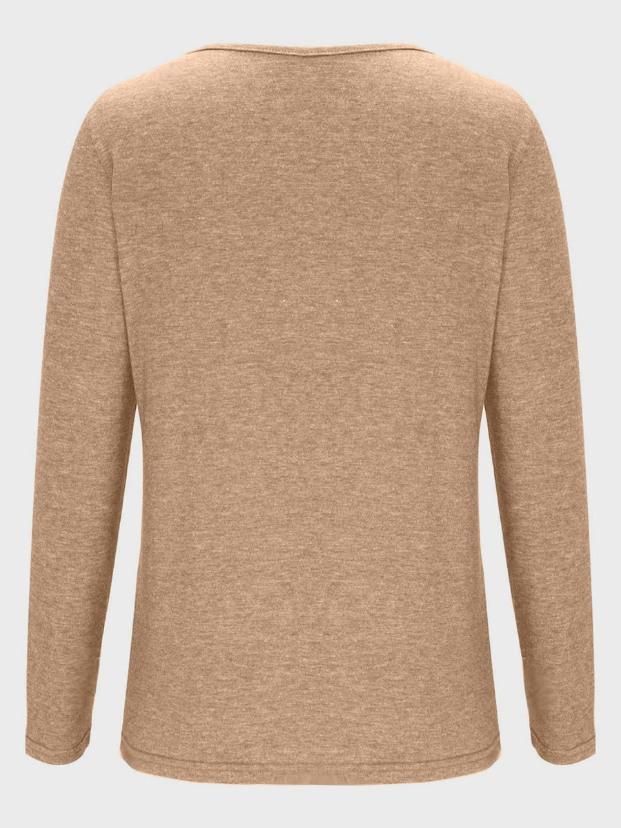 Tan long sleeve tee with a subtle textured knit and a wide neckline.