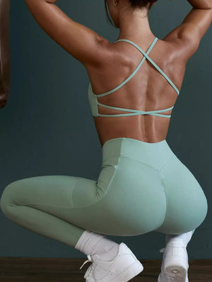 75% nylon, 25% spandex Care instructions: Machine wash cold sports bra in Turquoise with fitted silhouette
