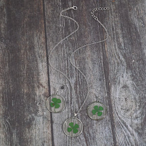 Pressed clover resin jewelry set with silver chain necklace and matching earrings.