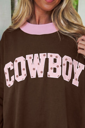 light pink sweatshirt featuring ribbed cuffs and color-block