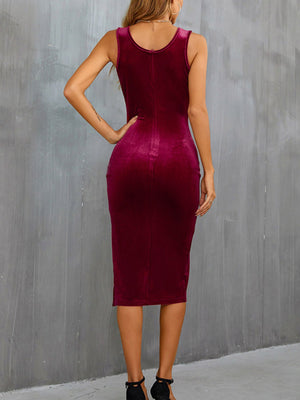 Burgundy velvet midi dress with slit, bodycon fit, sleeveless, round neck.