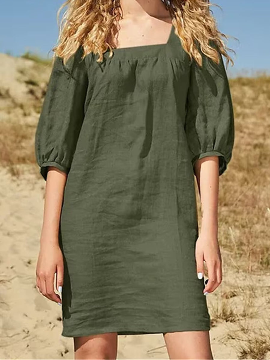 mini dress in olive green featuring seam detail and relaxed fit