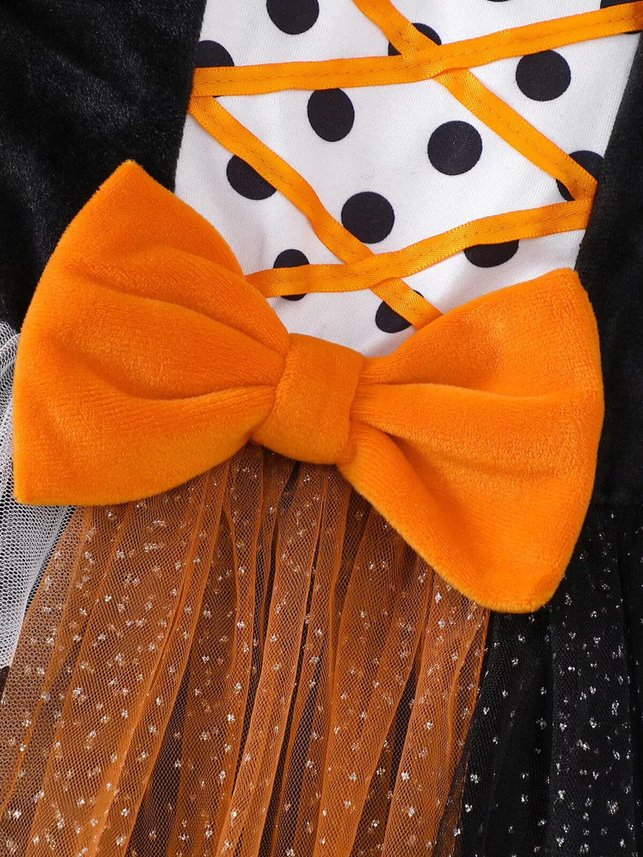 dress in orange with polka dot and mesh