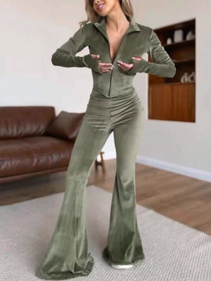 100% polyester Care instructions: Machine wash cold two-piece set in Black with fitted top, flared pants silhouette
