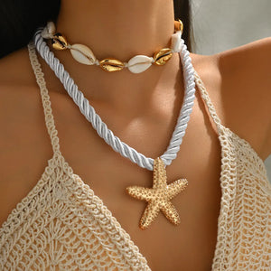 ACCESSORIES in gold featuring 2-piece set and layered fit