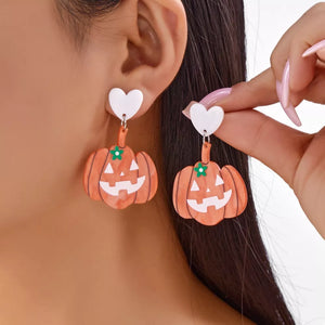 earrings in orange featuring drop design and drop fit