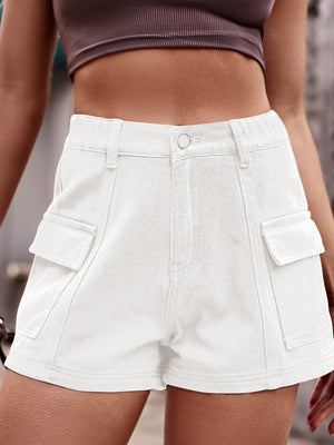 White denim high-waist cargo shorts with button and zipper closure and large side pockets.