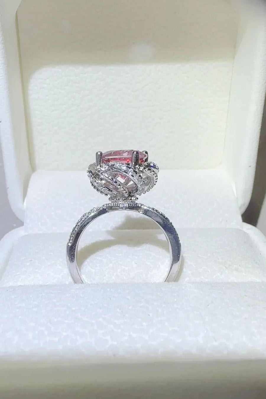Crimson Bloom Moissanite Halo Ring in cerise with a diamond-accented band.