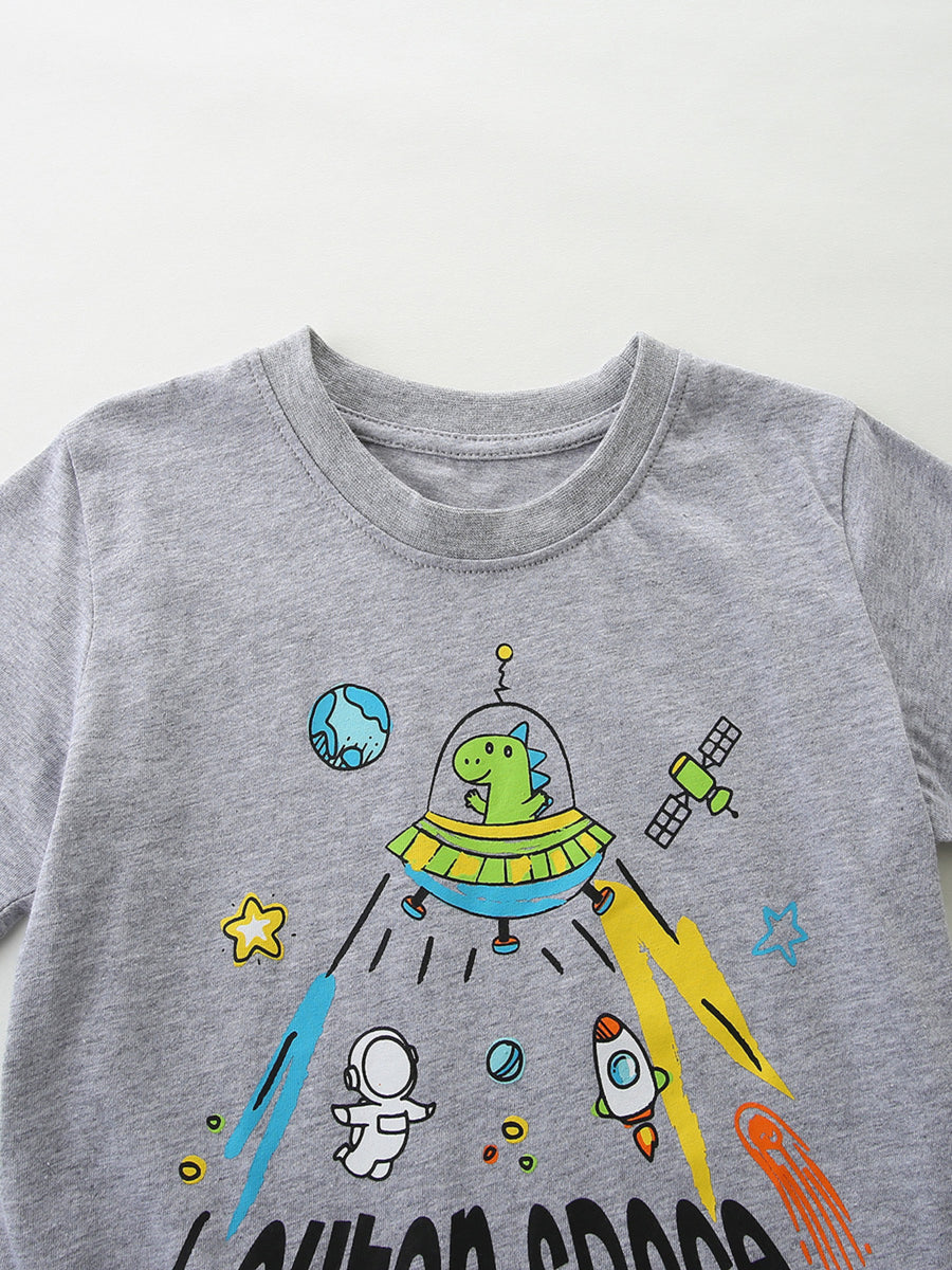 Grey cotton toddler t-shirt with a fun space graphic featuring a dinosaur in a UFO, astronaut, and rockets.