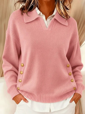 Red pullover sweater with decorative button and long sleeve