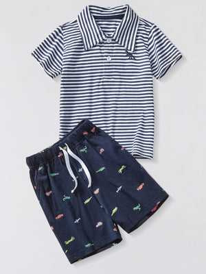 Toddler navy shorts with dinosaur and car print and striped polo shirt.
