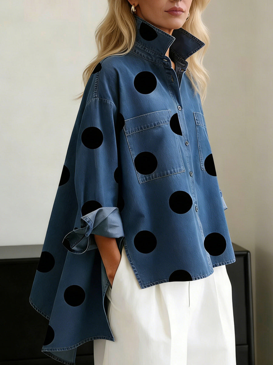 black button-up shirt featuring buttoned and polka-dot